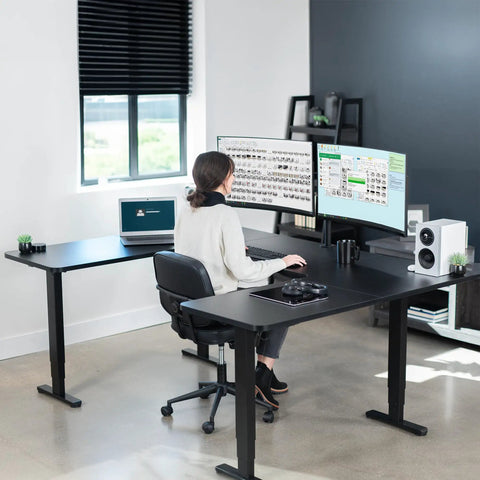 Rock Solid U Shaped Standing Desk Converters 83 By 60 Inches Black Sit Stand Converter with dual monitors in a workspace.