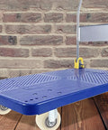 Top Notch 4 Pack 1.5 Inch Nylon Caster Wheels on a blue dolly, ideal for heavy furniture movement.