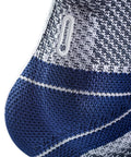 Close-up of MalleoTrain Ankle Support Brace For Right Foot Provides Stabilization For Ankle Muscles And Joints fabric texture detail