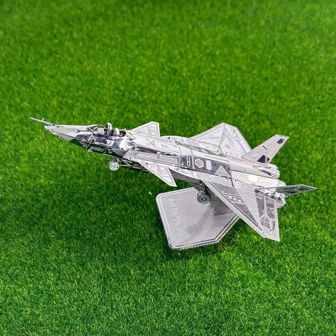 Advanced Dope 3D Metal Puzzle Kit For Adults, Fighter Jet Model J20 on green surface, stainless steel, no glue needed.