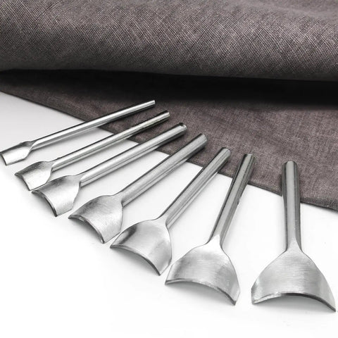 Seven Piece Leather Craft Tool Set With Half Round Arc Shaped Punches For Straps Belts Wallets And Bags DIYers Handwork Pro Grade Leatherworking Kit With Seven Size Range From 10mm To 40mm Durable Steel shown against a fabric backdrop.