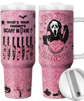 Totally Sick Halloween Scary Mask Tumbler With Lid And Straw 40 Oz Insulated Travel Cup in pink glitter with horror graphics.