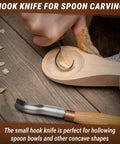 Sweet Complete Wood Spoon Carving Kit featuring razor sharp hook knife carving a wooden spoon bowl with shavings.