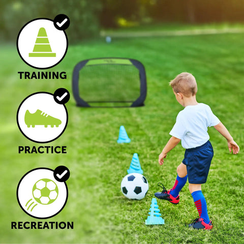Child playing soccer with Portable Soccer Goal Net Set With Two 4 Ft Pop Up Training Goals And Compact Carry Case in backyard.