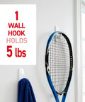 5 Pound Large Utility Hooks Kit With 14 Hangers And 16 Adhesive Strips Damage Free Wall Mounts holding tennis racket and towel
