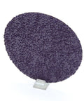 Close-up of a purple Cubitron II Roloc Fiber Disc 3 Inch 36 Plus Grit from a 15 pack, showcasing textured abrasive surface for metal grinding.
