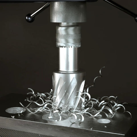 No Nonsense 5/8 Inch Annular Cutter With 3 Inch Pilot Pin For Magnetic Drill Press cutting into metal with metal shavings.