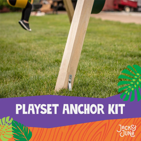 Wooden swing set leg secured to grass with Playset Anchor Kit For Swing Sets Heavy Duty Ground Anchors