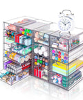 Clear Acrylic Desk Organizer With 20 Drawers In 4 Set Storage System For Office Supplies Makeup And Craft Storage Transparent Cosmetic Organizer Easy Access Desktop Drawer Box filled with pens and craft items.