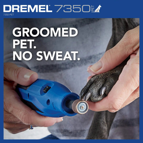 Low Key Quiet Pet Nail Grinder For Dogs And Cats Easy Peasy Paw Trimmer, close-up showing a hand grooming a pet's paw.