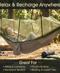 Heavy Duty Camping Hammock With Built-In Mosquito Net, 500 Lb Capacity, person relaxing outdoors