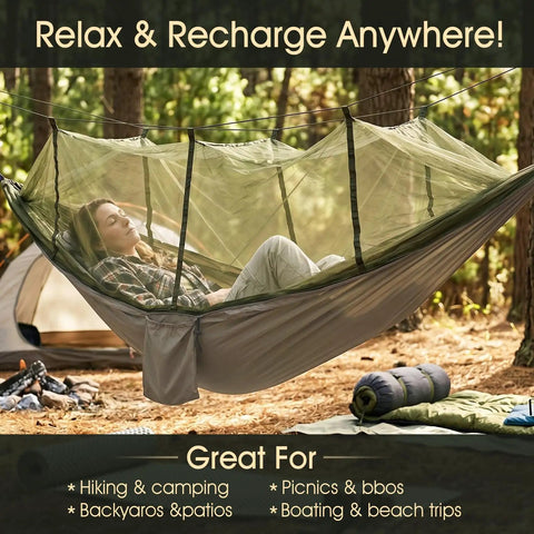 Heavy Duty Camping Hammock With Built-In Mosquito Net, 500 Lb Capacity, person relaxing outdoors