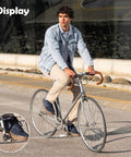 Man biking with Black Bike Crank Boot Protectors, 4 Pack Silicone Crankset Guards on road bike