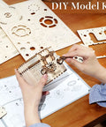 3D Wooden Gear Puzzle Box For Adults And Teens 14 And Up, Laser Cut Mechanical Model Kit Treasure Box With 158 Pieces, hands assembling wooden gears on table