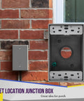 Weatherproof Outdoor Outlet Box With Three Quarter Inch Threaded Holes installed on brick wall, one gang receptacle
