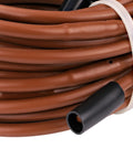 Close-up of 50 ft brown tubing from Drip Irrigation Kit For Vegetable Gardens With Fifty Feet Of One Quarter Inch Dripline, Three Quarter Inch FHT Adapter, Ten Hold-Down Stakes, And End Plug - No-Fuss Quick Setup Garden Watering System To Save Time And Water