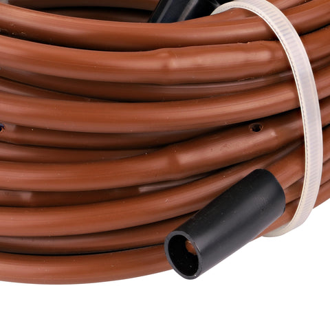 Close-up of 50 ft brown tubing from Drip Irrigation Kit For Vegetable Gardens With Fifty Feet Of One Quarter Inch Dripline, Three Quarter Inch FHT Adapter, Ten Hold-Down Stakes, And End Plug - No-Fuss Quick Setup Garden Watering System To Save Time And Water