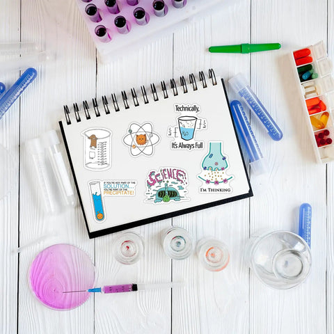Notebook with 100 Piece Science Stickers Pack For Chemistry Biology Physics Nerds, classroom decor and lab tools around.