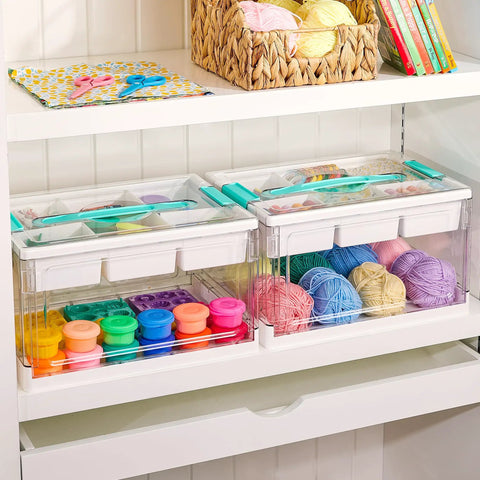 Two Big 24 Qt Clear Plastic Craft Organizers With Removable Trays And Dividers for Art Supplies on a white shelf.
