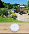 Heavy Duty Black Patio Furniture Glides And Table Feet Pads With Weather Beatproof Build For Rocking Chairs And Garden Tables on a wood surface.