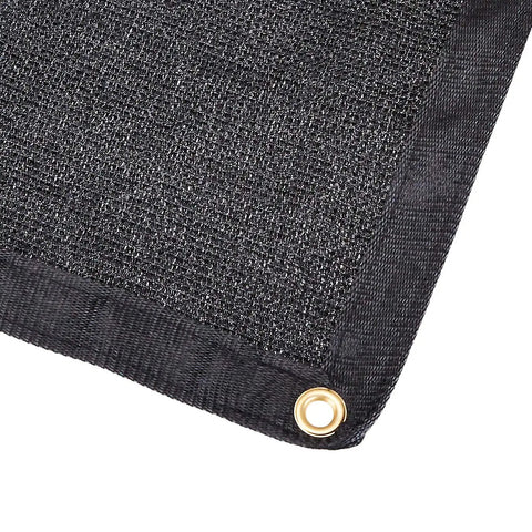 Corner view of Heavy Duty Water Resistant Knitted Mesh Tarp 16 By 24 Feet Black With Copper Grommets showing grommet and mesh texture