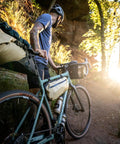 Cyclist on trail with Cabezon FB 6 Frame Bag For Bikes, 6L Waterproof Storage Pack For Commuting And All Terrain Riding, Reflective Trim