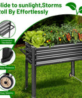 Heavy Duty Galvanized Raised Garden Bed With Legs And Wheels, Dark Grey, planted with vegetables, on grass