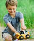 Child playing with Unstoppable Movers Front Loader With Realistic Lights And Sounds Motion Drive Technology Working Features Interactive Kid Friendly Construction Play For Ages 3 Plus