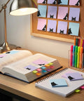 Black Cat 3x3 Sticky Notes Set on open book and cork board, colorful memo pads for office desk and back to school supplies.