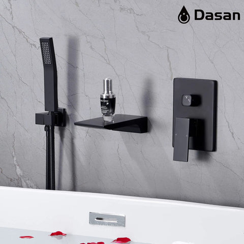Waterfall Tub Filler Faucet With Hand Shower, wall mounted matte black fixture in modern bathroom, seen with tub edge