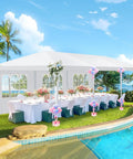 Spacious 10x30 Ft Outdoor Party Tent Canopy With Eight Removable Sidewalls And Two Zipper Doors set up by a poolside for an event