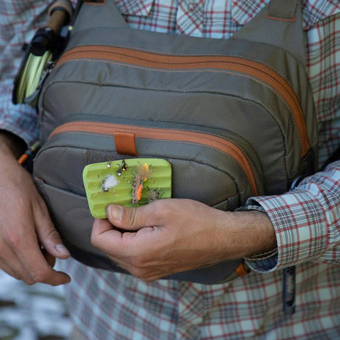 Cross Current Chest Pack For Fly Fishing Gear, Durable 210D Nylon Cyclepond Fabric, with fly box in hand, universal fit.