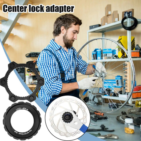 Mechanic using Beefy Center Lock Bike Rotor Tool For Upgrading Your Ride With Durable Aluminum Adapters And High Performance Brake Rotors