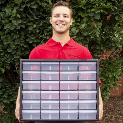 Person holding a 24 Drawer Plastic Storage Cabinet For Garage Organization And Small Parts Beads Bricks Tools Makeup And Crafts