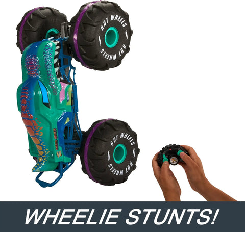 Mega-Wrex 1 To 6 Scale RC Monster Truck With Extra Large Remote Control performing wheelie stunt