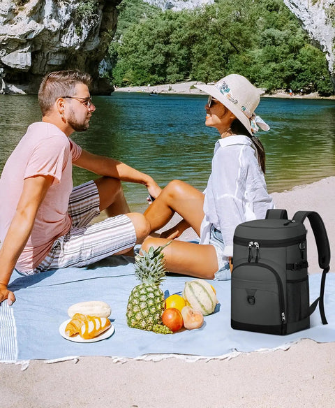 Couple on picnic by river with 22L Waterproof Insulated Cooler Backpack for Beach, Hiking, Camping and Travel, Leakproof Soft Pack