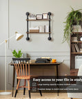 Heavy Duty Double Tier Industrial Pipe Wall Shelves With Genuine Rustic Wood storing books and decor above a desk in a study.