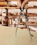 Professional All Metal Drafting Compass With Lockable Slider And Pencil Holder Slick Divider Tool Built Rock Solid For Carpentry And Leather Work dead on accuracy every single time up to seventeen inches wide, marking a circle on wood.