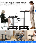 Mobile Laptop Standing Desk with adjustable height and smooth wheels used by standing and sitting individuals, in black.