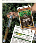 Person holding a soil sample and Laboratory Soil-Test Kit for deer food plots with instructional sheet on grass