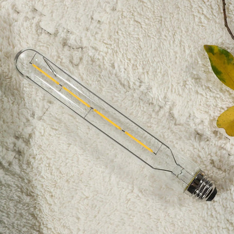 T10 LED Long Bulbs 4W Dimmable Tubular Filament Bulb, 2700K Warm White, 8.9 Inch, E26 Edison Style on textured surface