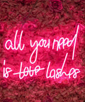 All You Need Is Love Neon Sign Light Pink LED Neon For Bedroom Bar Party Home Wall Decor Dope Vibe Energy Efficient Hanging Sign Custom Neon Light For Mood Lighting And Selfies on floral background.