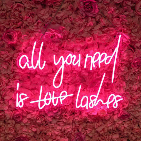 All You Need Is Love Neon Sign Light Pink LED Neon For Bedroom Bar Party Home Wall Decor Dope Vibe Energy Efficient Hanging Sign Custom Neon Light For Mood Lighting And Selfies on floral background.