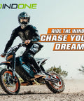 Rider on RM7 Electric Dirt Bike For Teens And Adults, 2200W Peak Motor, Dual Hydraulic Brakes, full suspension on rocky terrain