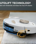 Side view of Stratos 2 In 1 Robot Vacuum And Mop With 25 Plus Dope Hands Free Features And NeverTouch Self Cleaning Base shown on carpet
