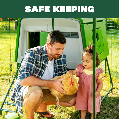 Father and daughter with a chicken by a Large Plastic Chicken Coop For Easy Cleaning And A Secure Hen House
