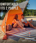 Lightweight Beach Shade Tent With Pre Attached Poles Large Sun Shelter For Sand And Sun shown at beach fitting two people