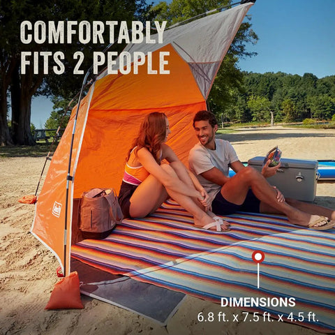 Lightweight Beach Shade Tent With Pre Attached Poles Large Sun Shelter For Sand And Sun shown at beach fitting two people