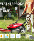 Heavy Duty 25 Foot Outdoor Extension Cord Built Tough For Real Outdoor Jobs 10 Gauge Waterproof Black With Lighted End connected to a lawn mower in a grassy yard.