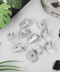 Heavy Duty Steel Cabinet Shelf Clips Set Of 10, Lightweight Yet Sturdy Shelf Support Pegs, shown with a hammer